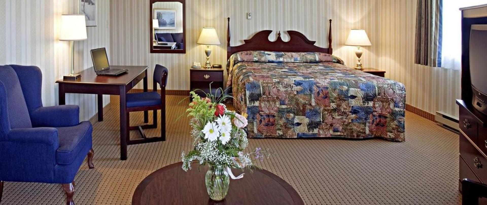 quality-hotel-suites-photos-room.JPEG.1140x481_0_233_5937 (1).JPEG
